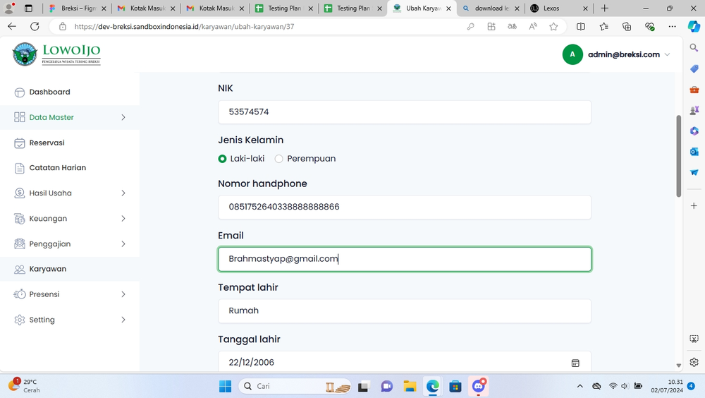 Green double couch with wooden legs